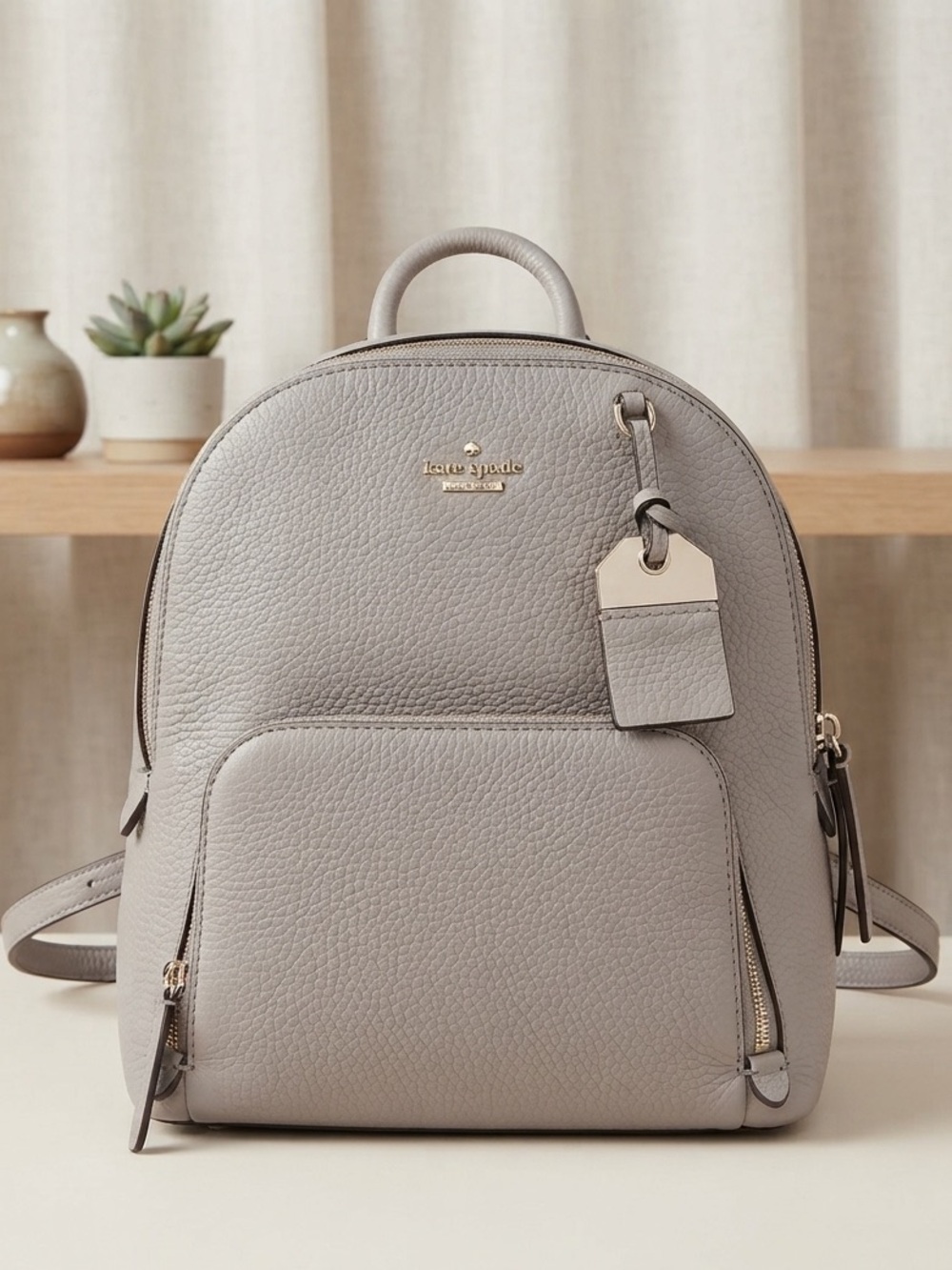 Kate Spade Caden Carter soft taupe Pebbled Leather Mini backpack